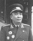 譚政